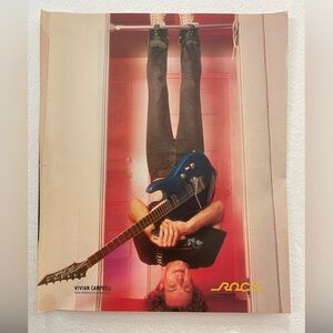 Blue Electric Guitar Pinup
Of Vivian Campbell